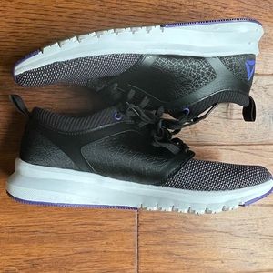 Rebook training shoes.